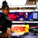 Megan Thee Stallion poses for a photo in the Red Bull Racing garage before the F1 Grand Prix of USA on October 24, 2021 in Austin, Texas.